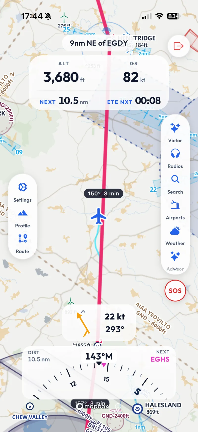 The same app in flight on an iPhone: altitude and ground speed set large across the top, the distance and time to the next waypoint under them, the wind, a heading strip, and the aircraft drawn on its track over a decluttered map.